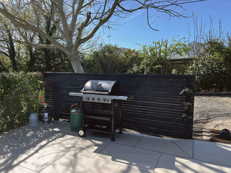 Gas barbecue by the patio